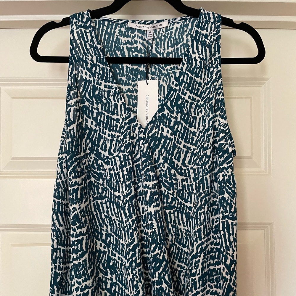 Creative concepts top, new, teal and white. Medium